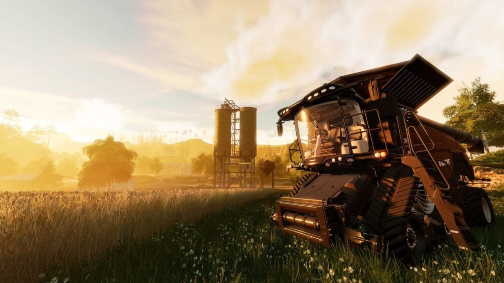 wschód słońca podczas pracy na polu w grze farming simulator 19