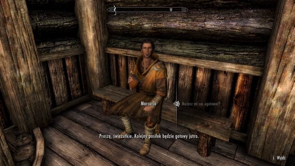 Screenshot z gry Skyrim - posiłek